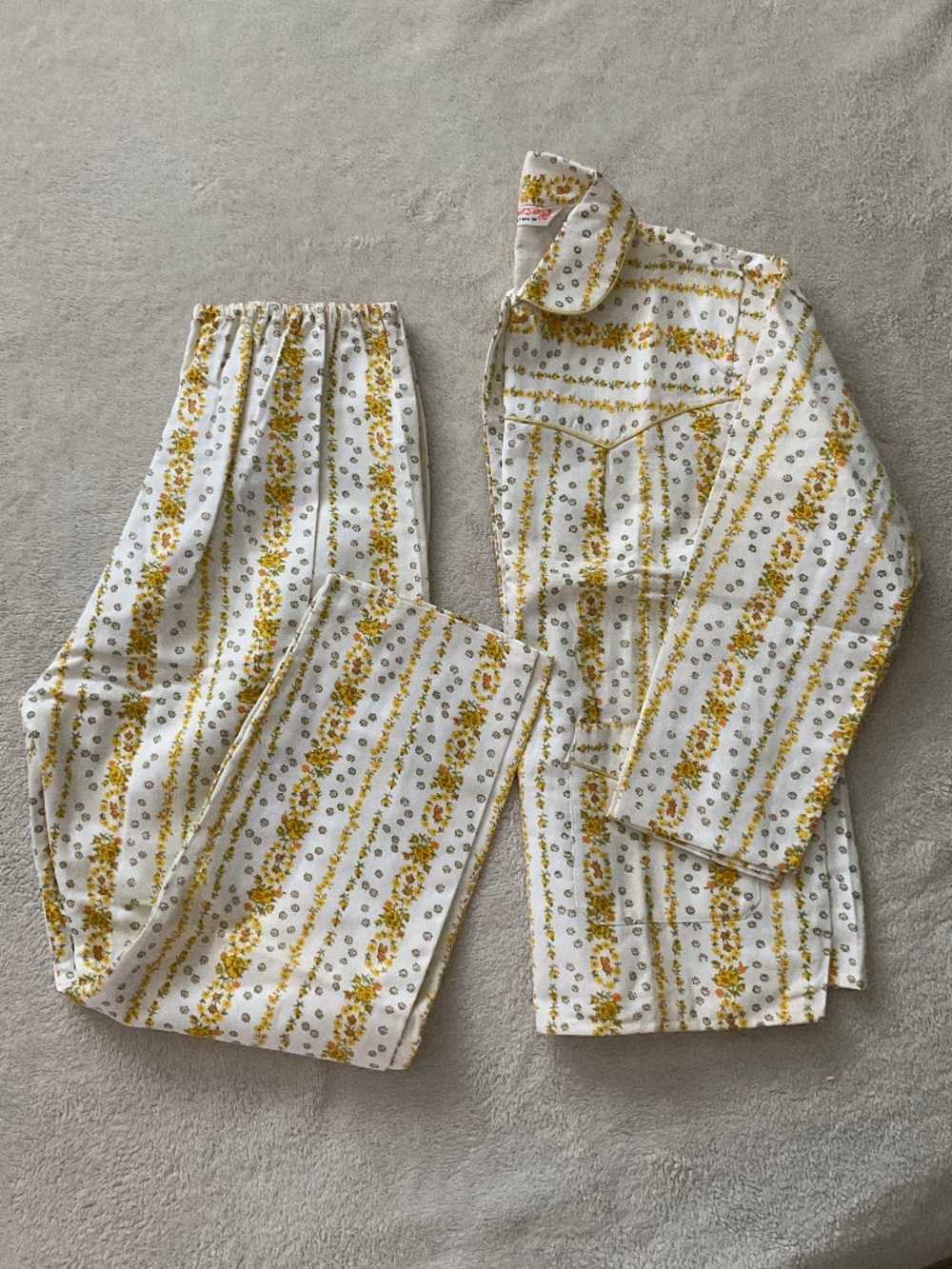 Vintage two piece pajama set featuring yellow and orange floral pattern, medium